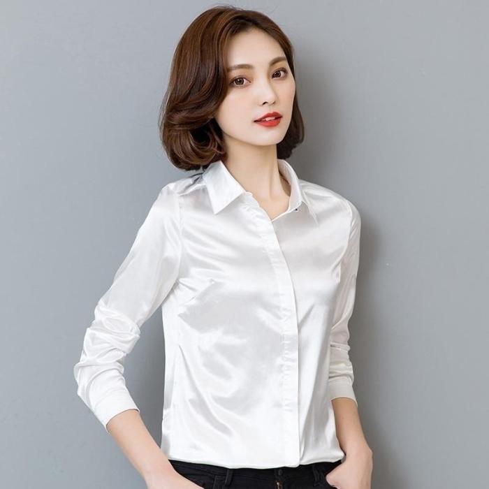 Woman in white dress shirt